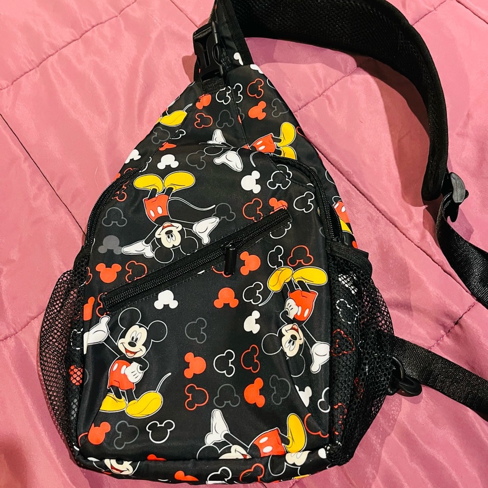 NWOT Mickey Mouse Sling Bag 15”x 81/2” with 2 zipper pockets and two side bottle